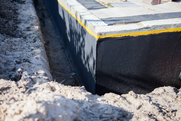 Professional Basement Waterproofing technician working in South Bend, IN